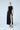HIGH-SLIT PLEATED SKIRT